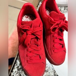 Red puma sneakers